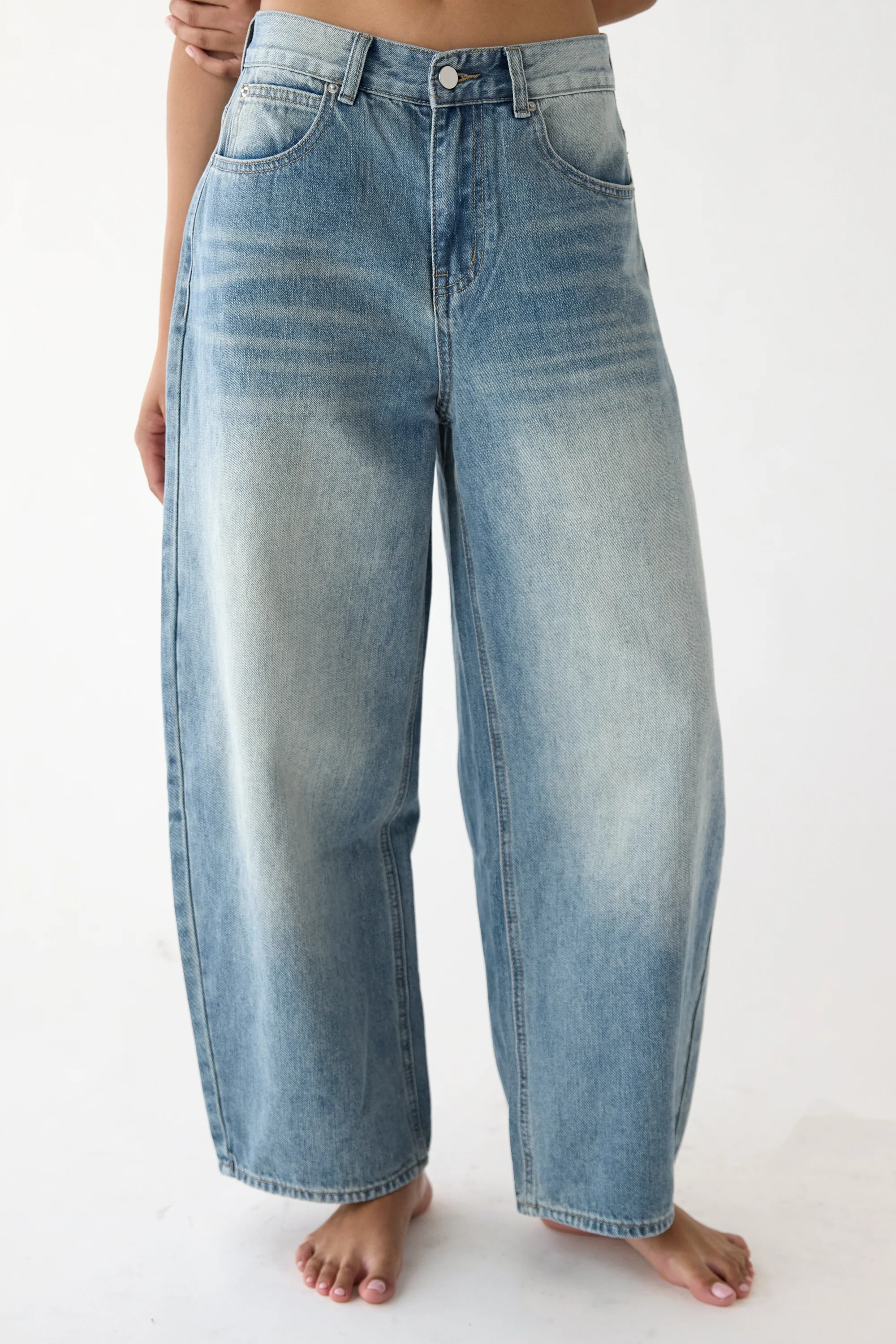27" CURVE LEG MID RISE DENIM JEAN - Image 6